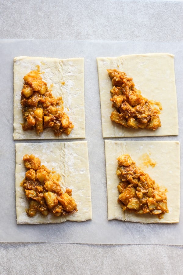 Filling puff pastry with curry potatoes