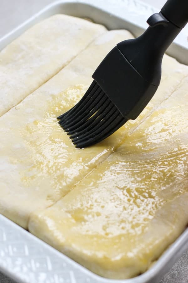 Brushing egg washout puff pastry sheet