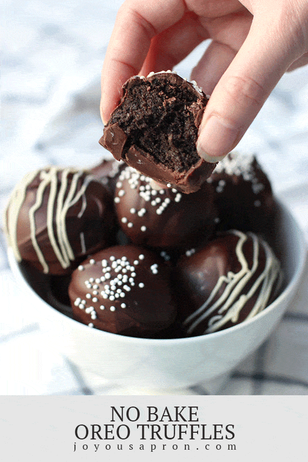 Oreo Truffles - the perfect no-bake treat! These Oreo Balls combine lots of crushed Oreos with cream cheese, covered with lots of chocolate. Such a delicious and easy dessert and sweet treat. via @joyousapron