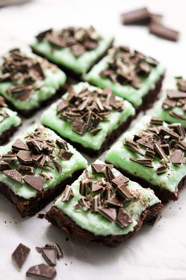 Chocolate Brownies topped with mint icing and Andes Mint pieces