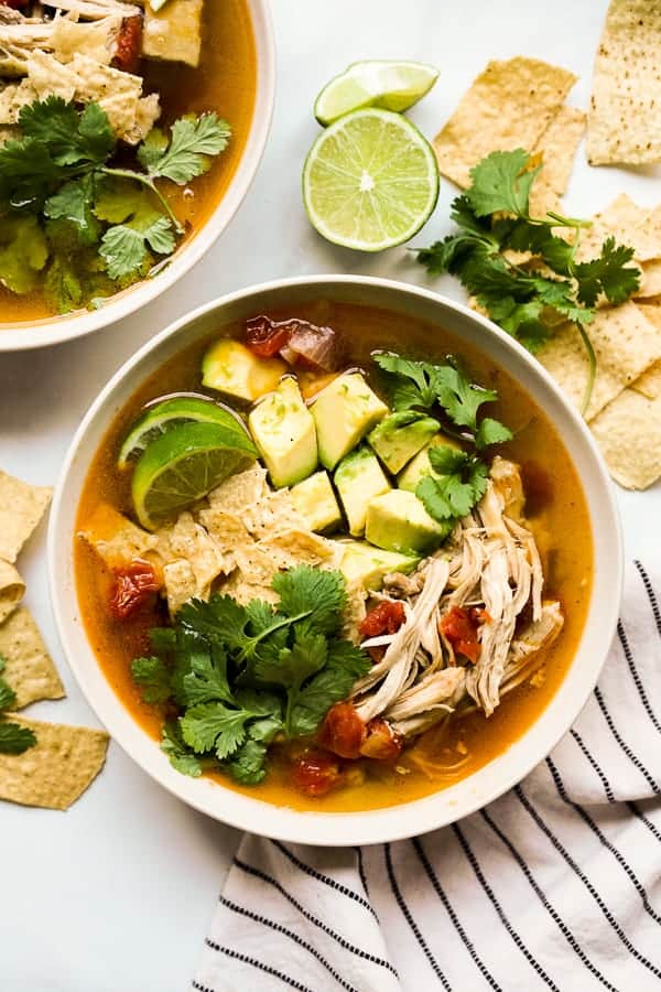 Top down view of a bowl of chicken tortilla soup