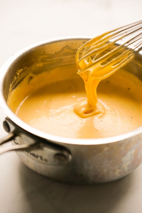 A pot of cheese sauce