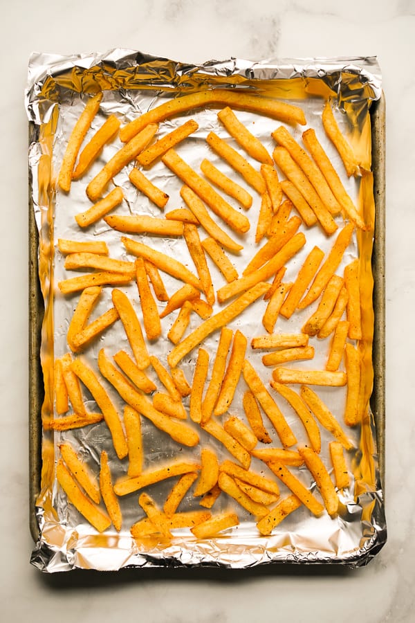 Baked fries on a baking sheet