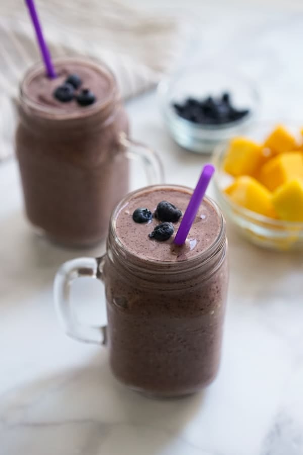 Two glasses of Blueberry Mango Smoothie