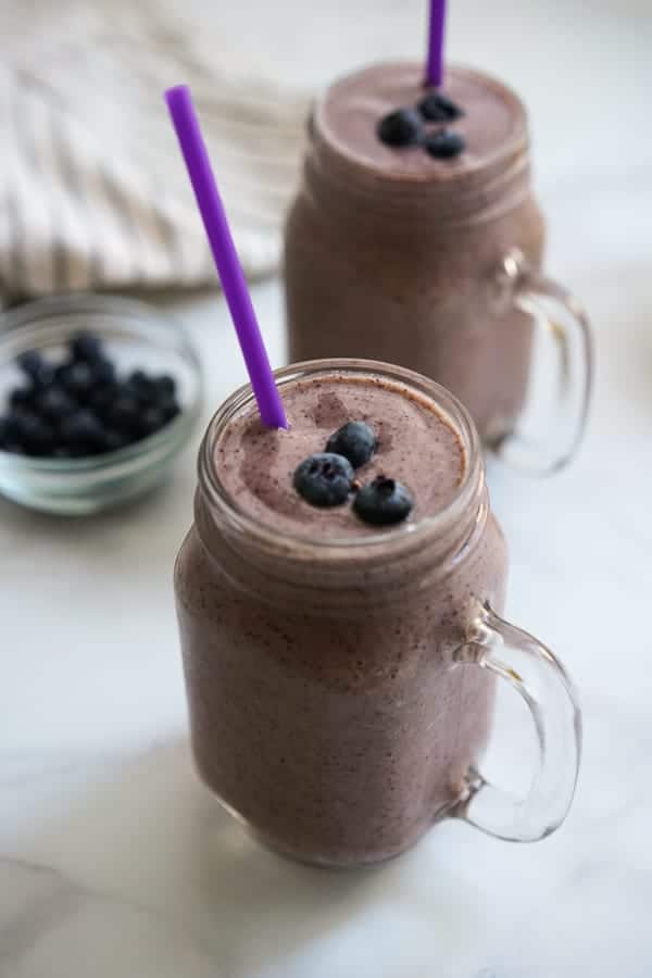 Two glasses of Blueberry Mango Smoothie