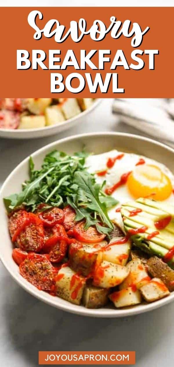 Savory Breakfast Bowl - a healthy, delicious and easy low carb breakfast and brunch! Filled with roasted potatoes, roasted tomatoes, avocados, egg arugula and drizzled with sriracha. Gluten free and vegetarian. via @joyousapron