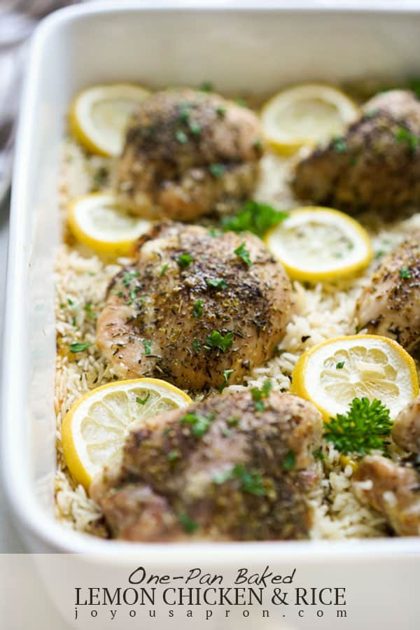 Baked Lemon Chicken and Rice - easy one pan oven baked dish! Fluffy lemon flavored rice cooked in white wine and chicken broth, topped with roasted herb lemon chicken thighs, all baked in one casserole dish. via @joyousapron