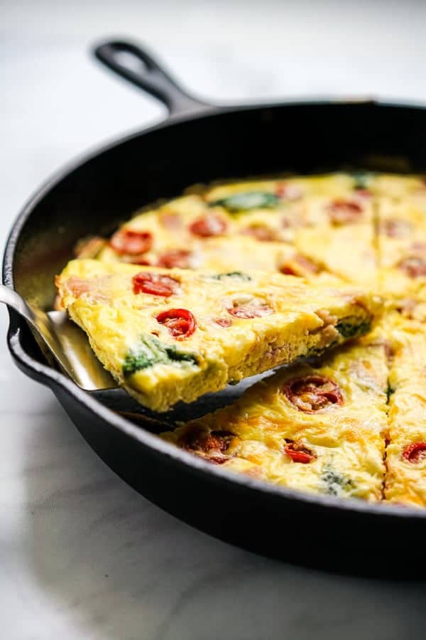 Lifting up a triangular slice of frittata