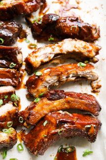 Sticky ribs lined up on a pan