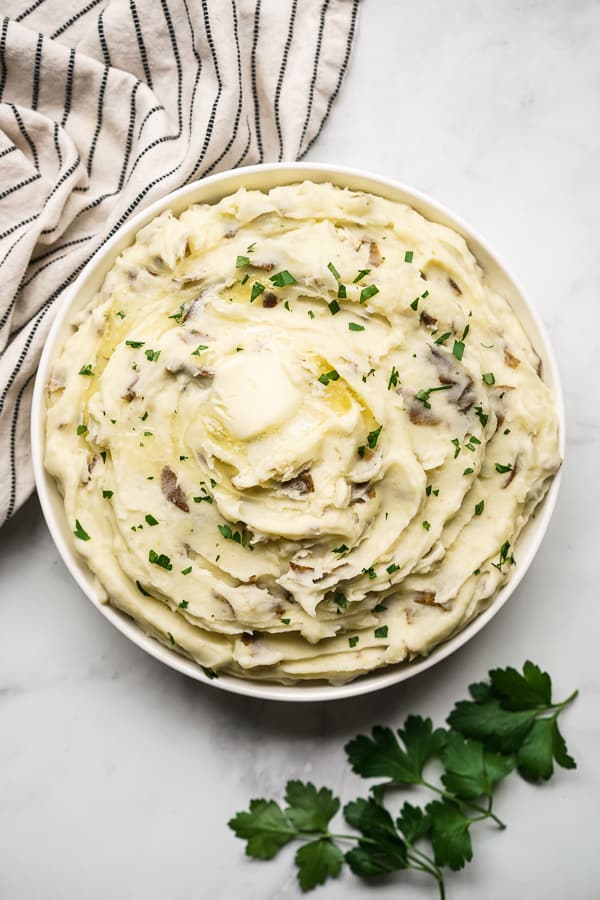 Flat lay view of a large bowl of mashed potatoes