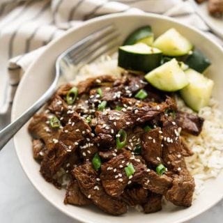 A bowl of beef bulgogi with fork