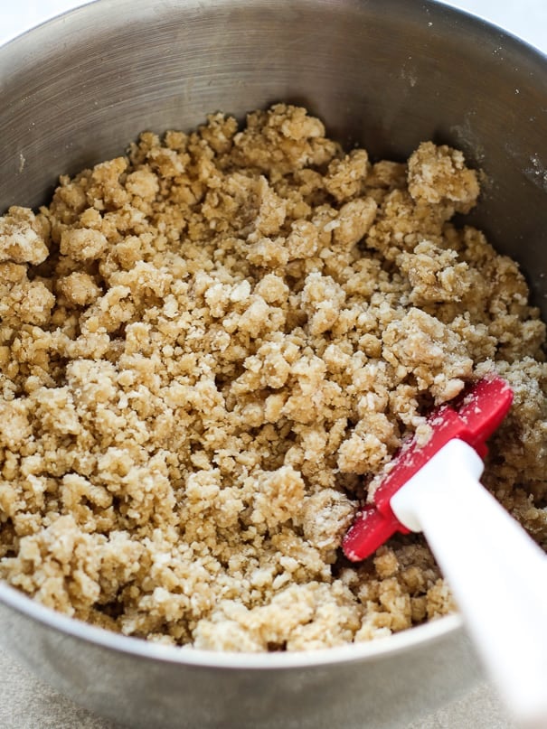 Mixing crumble dough in a large bowl