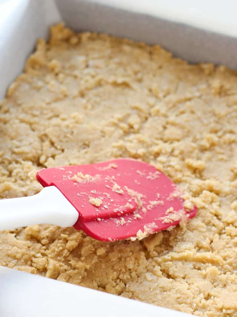 Pressing crumble with a spatula