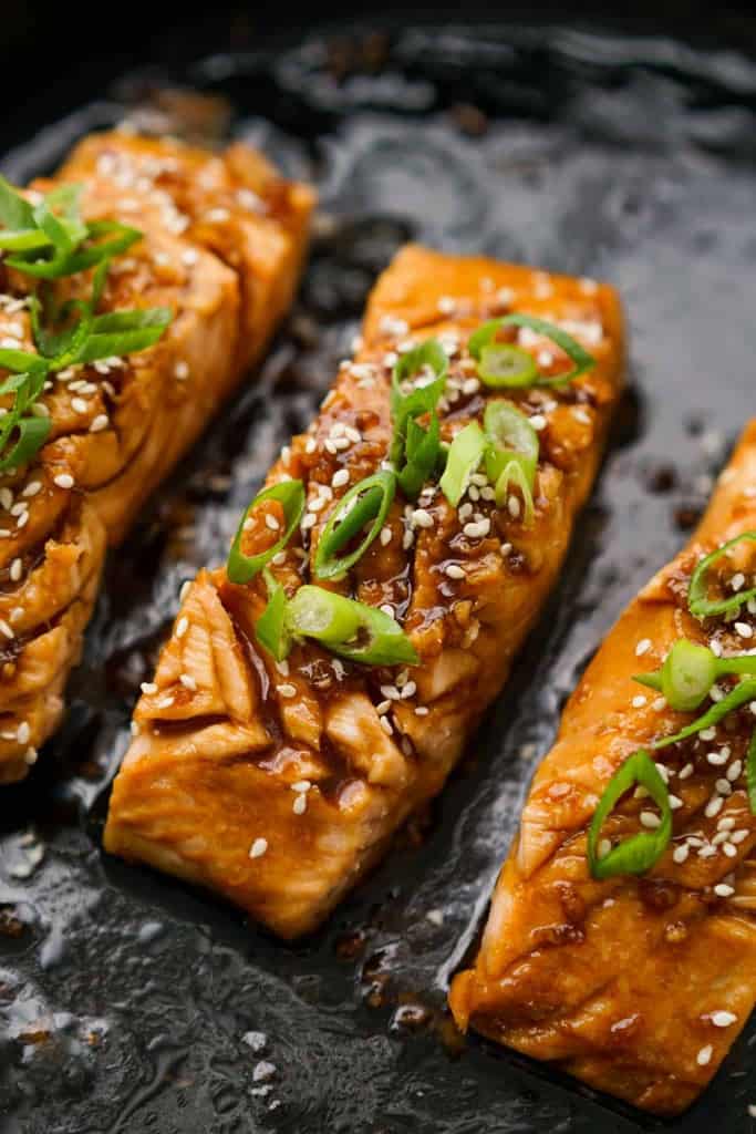 Close up of Pan Fried Teriyaki Salmon on skillet