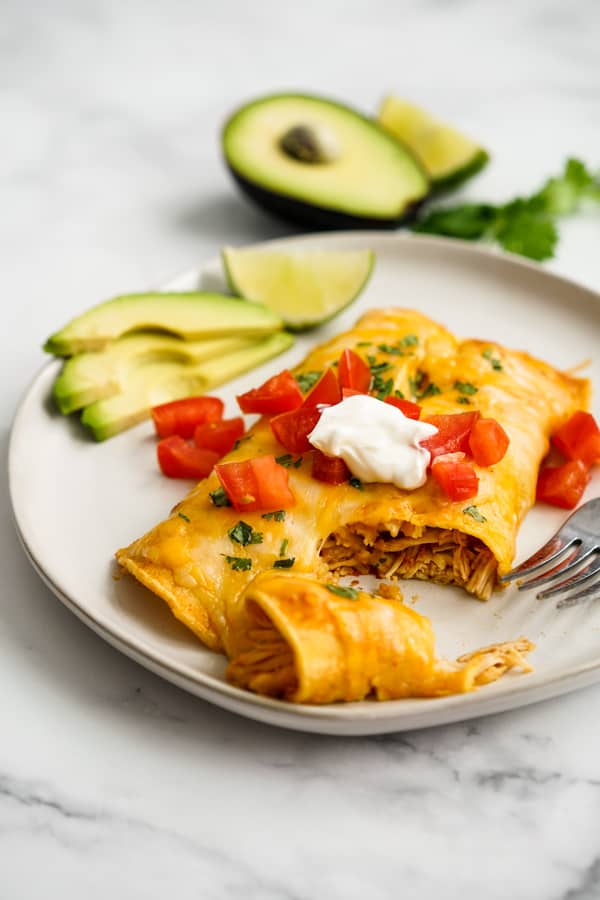 Instant Pot Chicken Enchilada that has been cut into with a fork