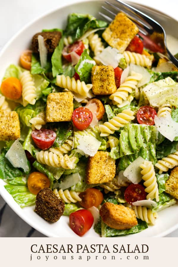 Caesar Pasta Salad - healthy delicious and easy pasta salad recipe! Romaine lettuce, pasta, tomatoes, parmesan cheese and croutons tossed in a homemade caesar dressing. A yummy summer side dish for bbq, cookouts, dinners and more! via @joyousapron