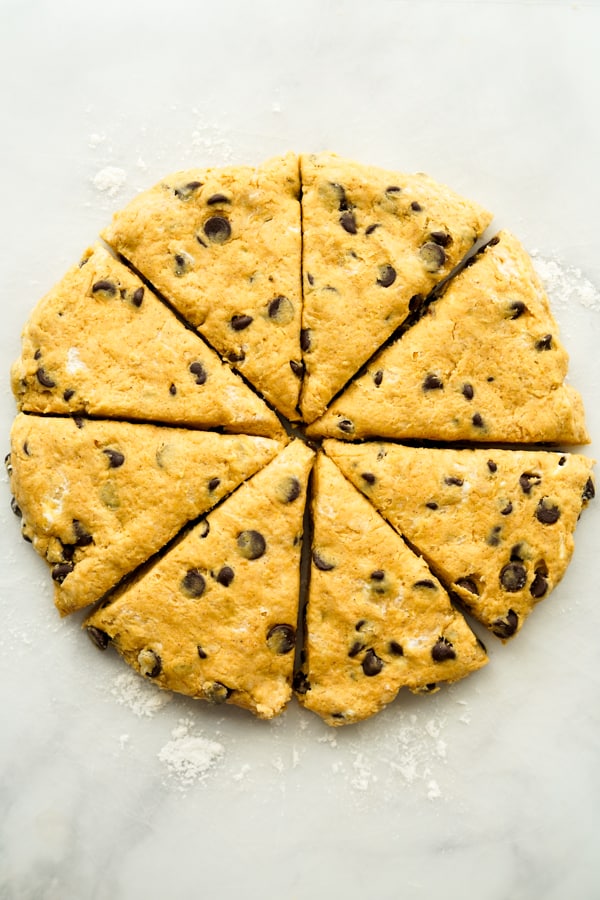 Scones dough flattened and sliced into wedges