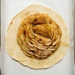 Pie crust with apple slices in the middle