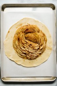 Pie crust with apple slices in the middle