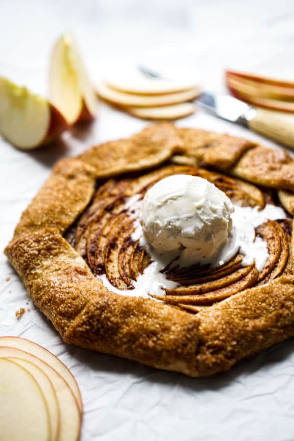 Apple cinnamon galette topped with melted vanilla ice cream