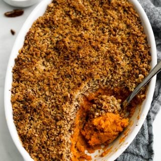 Spoon scooping out Sweet Potato Casserole