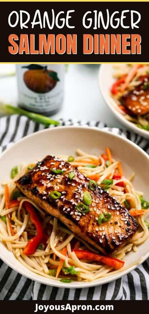 Orange Ginger Salmon and Noodles - healthy, easy and delicious seafood noodles dinner! Salmon coated in a sticky sweet and tangy Orange glaze, sitting on a bed of noodles tossed with bell peppers, carrots, and a delicious Orange Ginger Sauce. via @joyousapron
