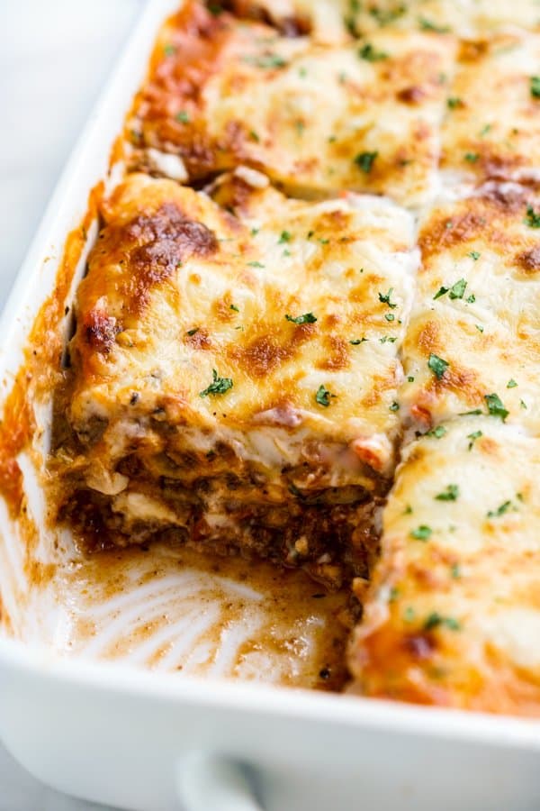 Lasagna with layers of pasta, bolognese sauce and Béchamel sauce in a casserole