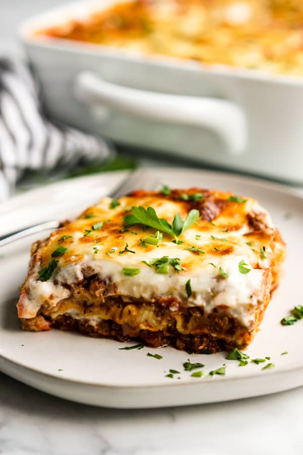 A slice of lasagna on a plate