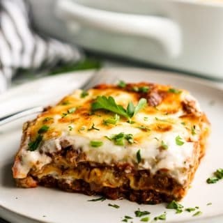 A slice of lasagna on a plate