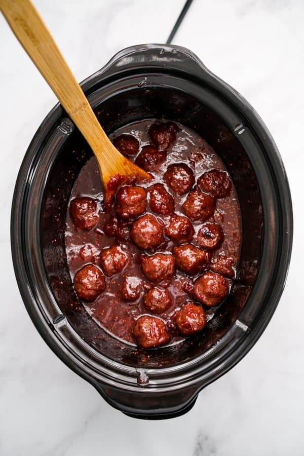 Cranberry meatballs with sticky sauce in the slow cooker