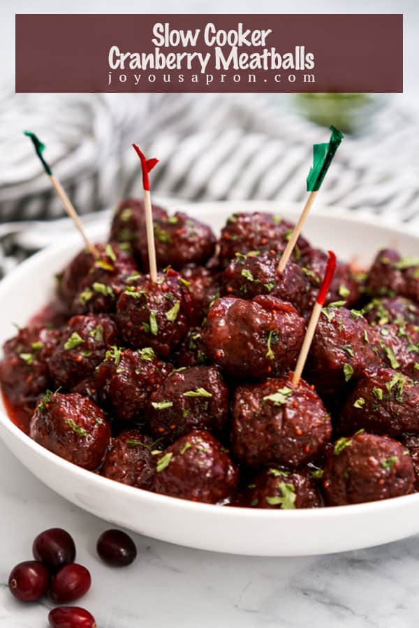 Cranberry Meatballs - easy crockpot party food, perfect for the Christmas or Thanksgiving holidays! Meatballs cooked in the slow cooker, and coated in sticky sweet and tangy cranberry based sauce. So flavorful! via @joyousapron