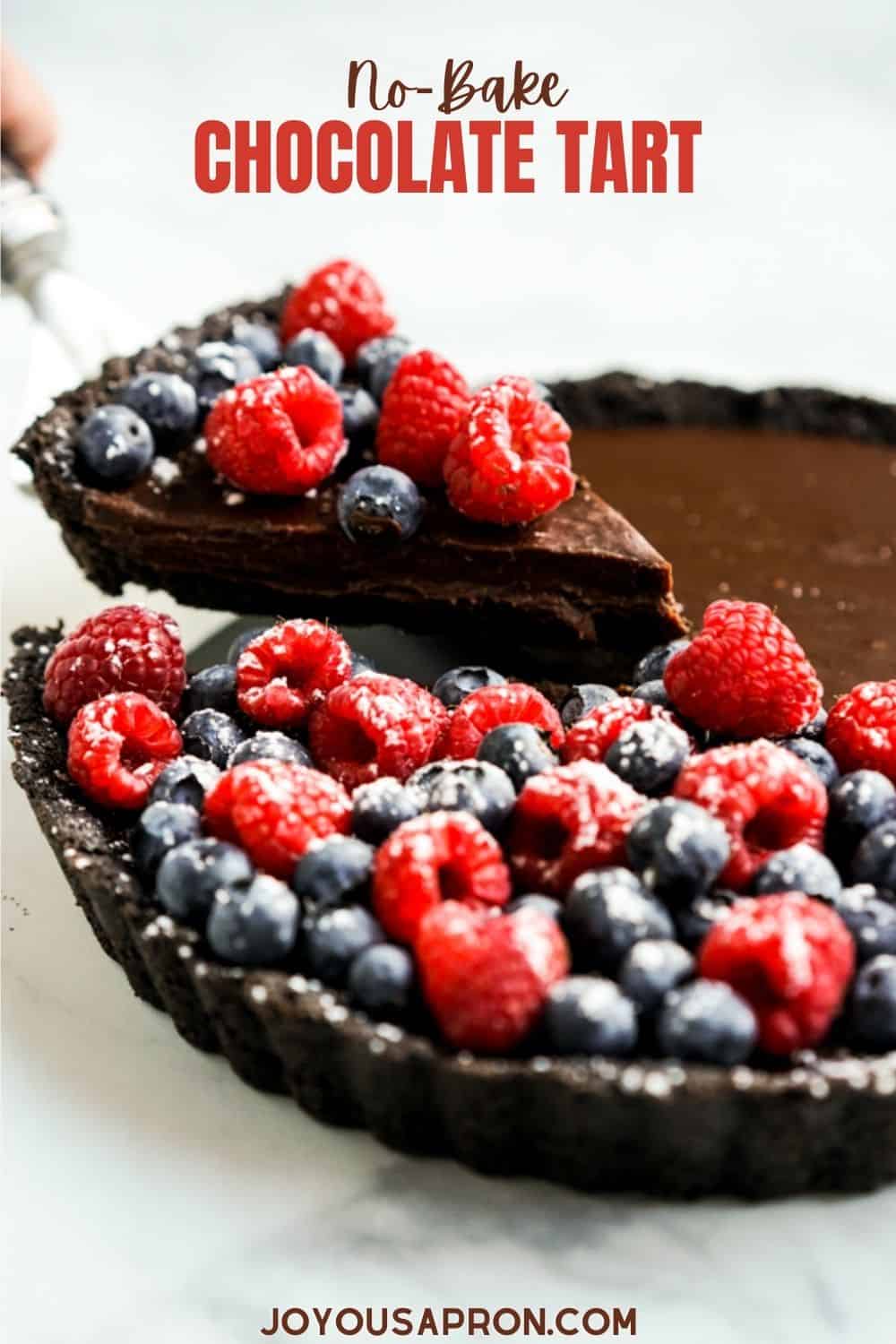 No-Bake Chocolate Tart - Oreo crust topped with rich, velvety dark chocolate ganache filling, served with berries. A delightful and easy no-bake dessert! via @joyousapron