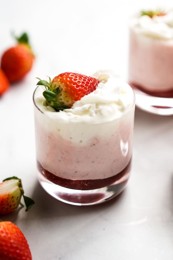 Strawberry mousse with whipped cream on top