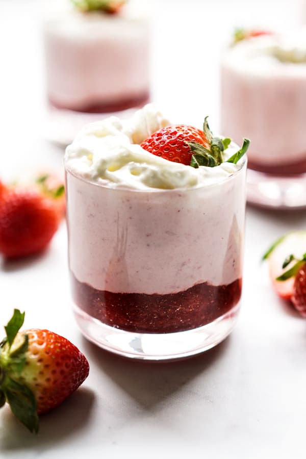 Layers of strawberry sauce, strawberry mousse, whipped cream and fresh strawberries.