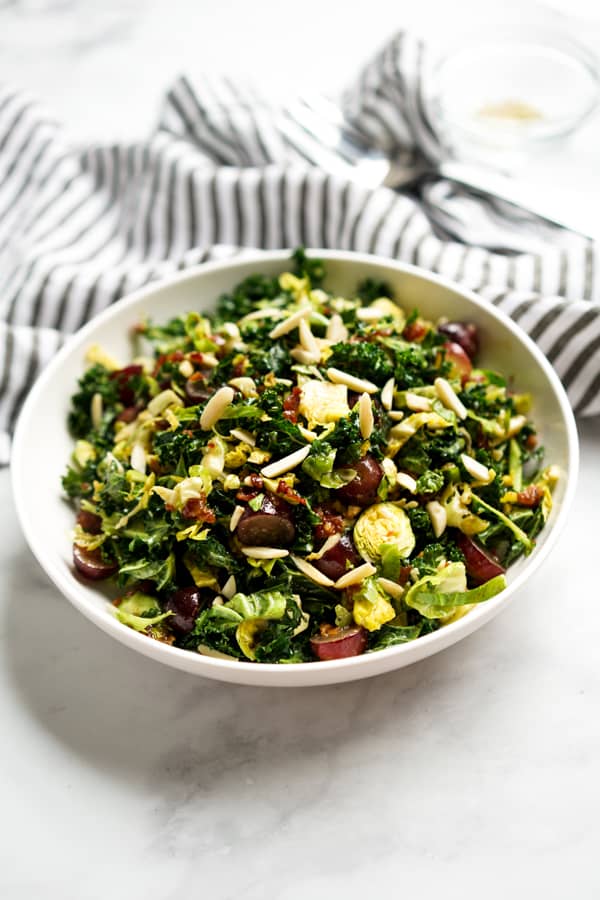 A bowl of tossed brussels sprouts and kale