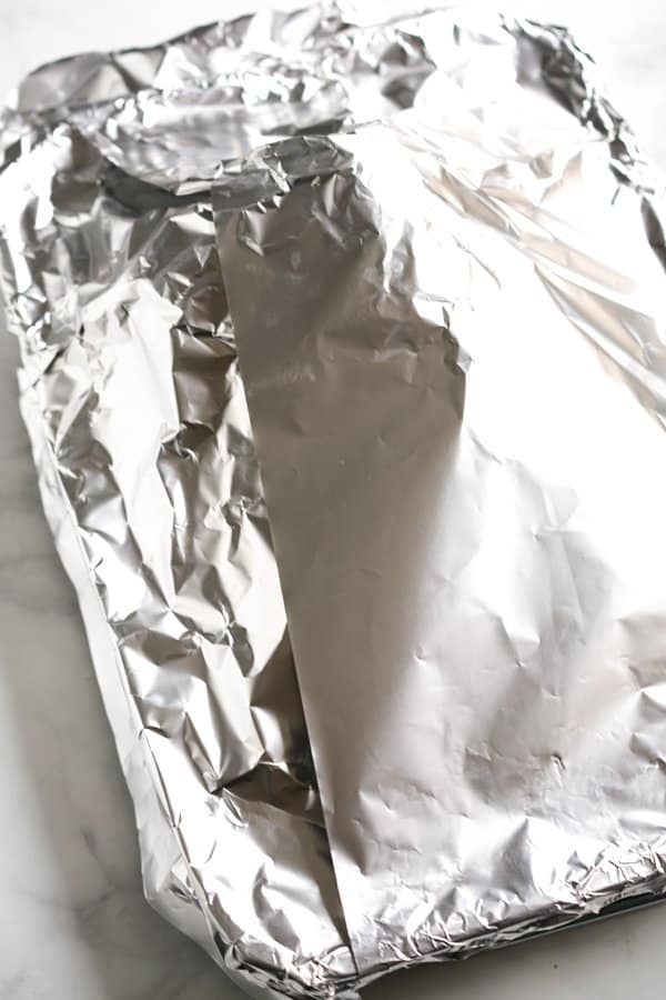 Foil covering roasting dish