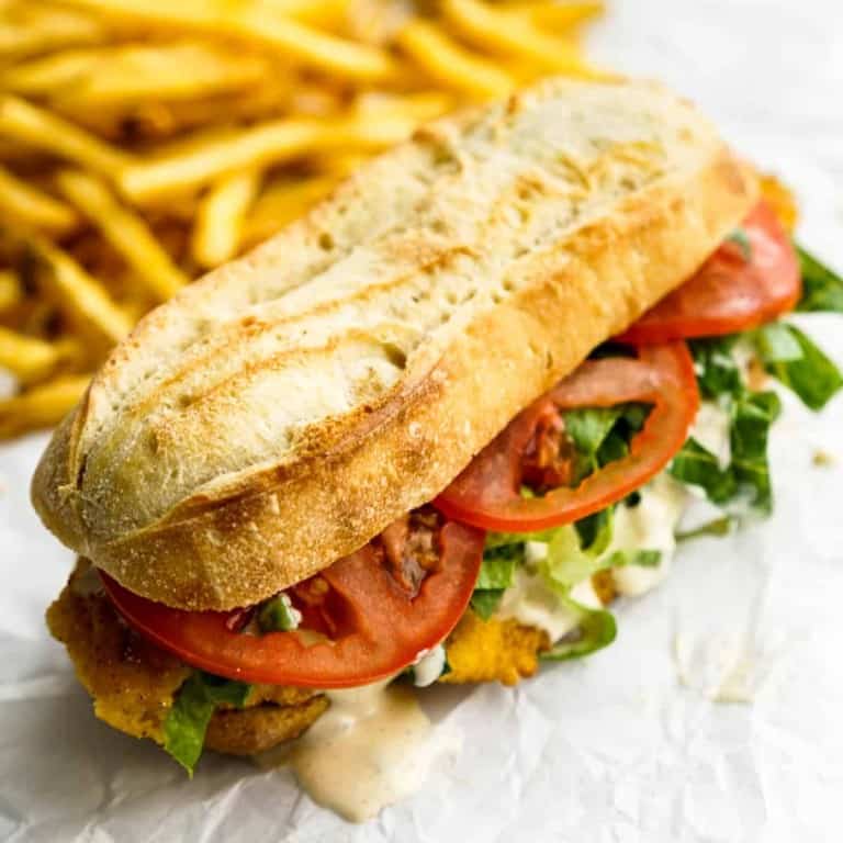 Fish Po Boy Sandwich with fries in the background