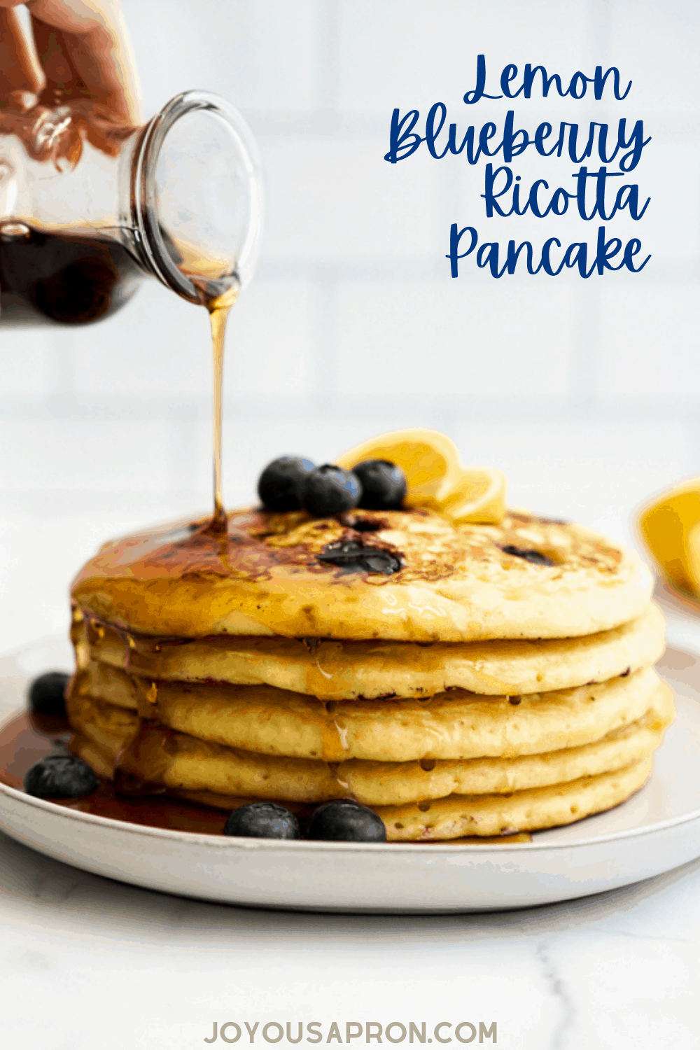 Blueberry Lemon Ricotta Pancake - easy, light and fluffy lemon ricotta pancake filled with fresh blueberries makes for a delicious brunch and breakfast! Serve with maple syrup. via @joyousapron