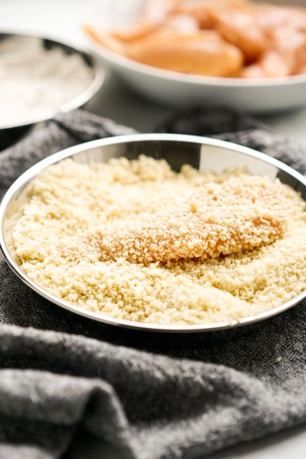 Coat chicken tenders in panko mixture