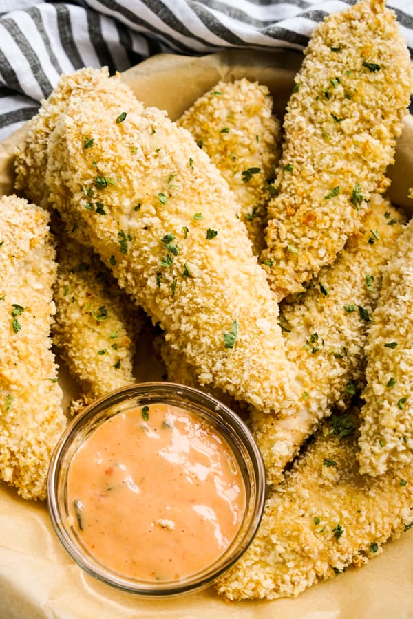 Closeup of chicken tenders breaded in panko breadcrumbs