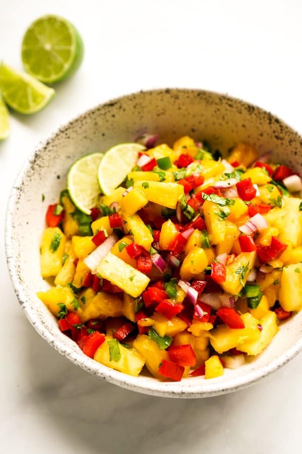 A bowl of pineapple mango salsa 