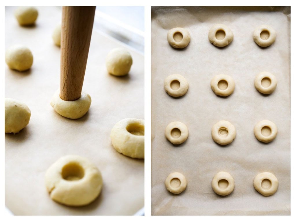 Making an indention with the end of a rolling pin in the middle of a cookie dough ball