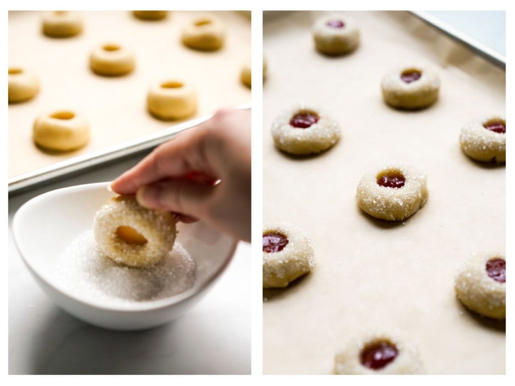 Dipping thumprint cookie dough into coarse sugar mixture, then filled with strawberry jam