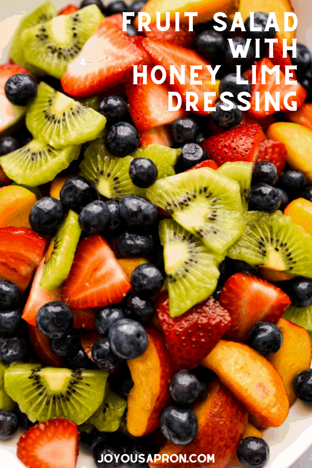 Fruit Salad with Honey Lime Dressing - summer fruits drizzled with a sweet and tangy honey lime dressing. Refreshing, delicious and full of great fruity flavors! An easy side for any meals, potlucks and parties. via @joyousapron