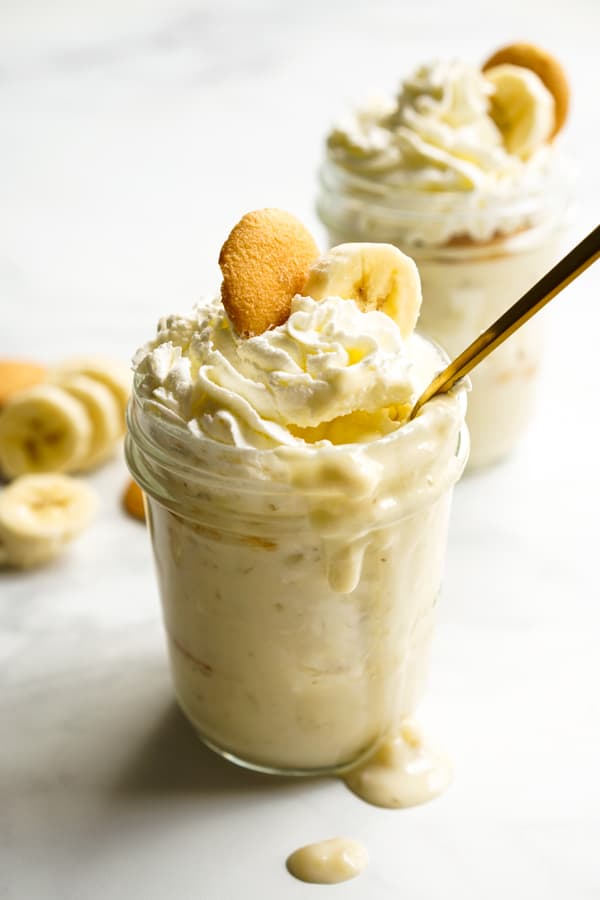 Scooping into banana pudding in a jar