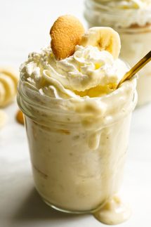 Spoon scooping out some mason jar banana pudding