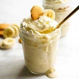 Spoon scooping out some mason jar banana pudding