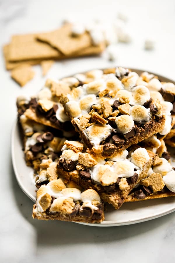 A plate of S'mores Bars stacked on top of each other