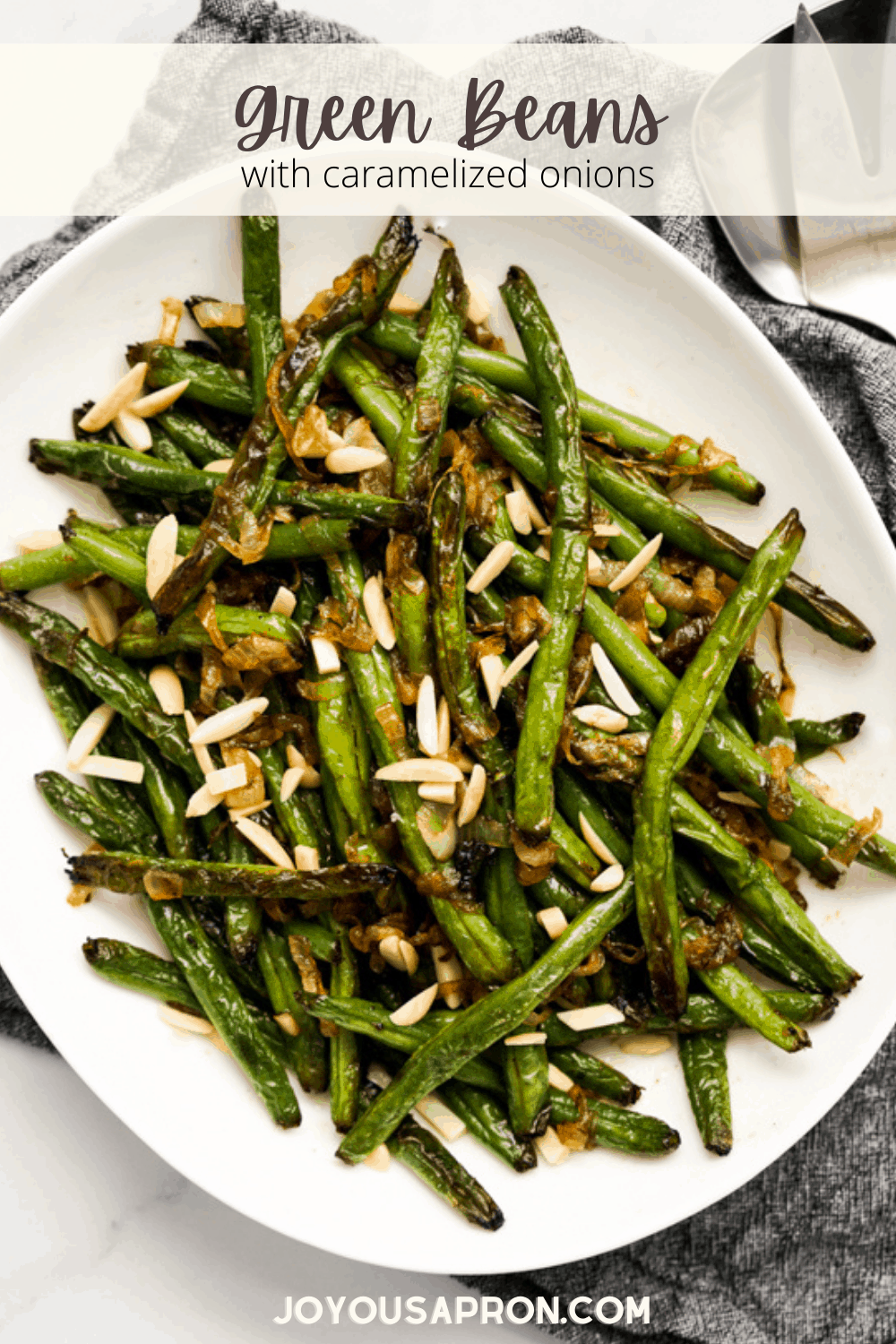 Green Beans with Caramelized Onions - A easy and delicious veggie side dish! Sweet caramelized onions sautéed with crunchy green beans, toss with garlic, butter, sea salt, then topped with shaved almonds.  via @joyousapron