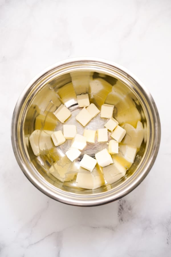 Cold cubed butter in a bowl